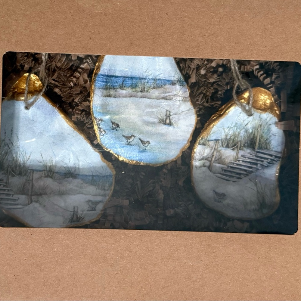 Set of 3 hand made hand crafted oyster shell ornaments.